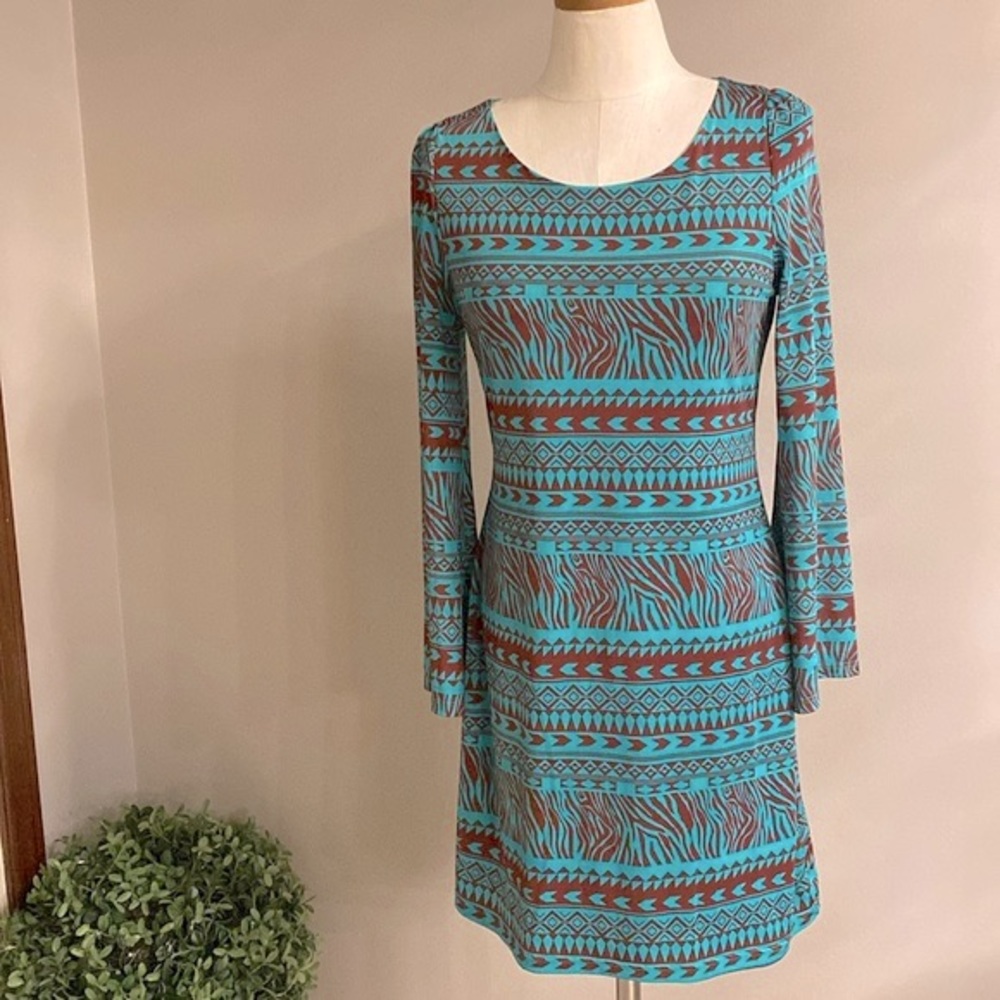 Nicola Antoni woman’s abstract geometric design turquoise dress bell sleeve